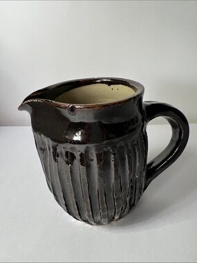 Dark Brown Glazed Ceramic Pitcher with Fluted Body